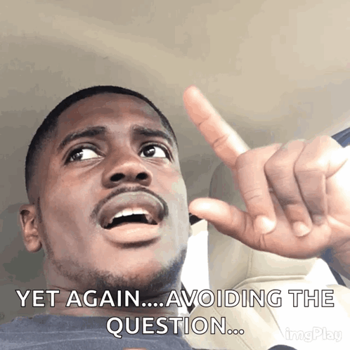 Man Making Funny Face Avoiding Question