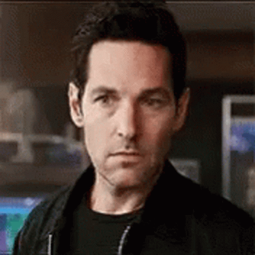 Man Making Funny Face in Black Jacket and Shirt
