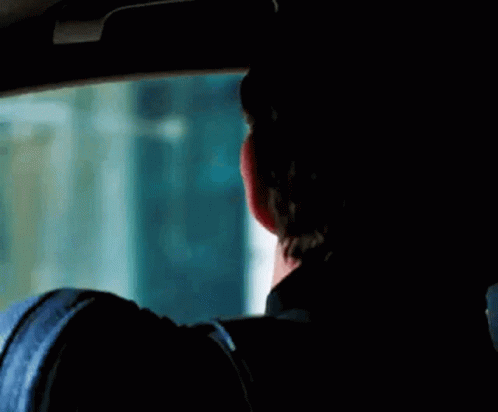 Man Making Funny Face In Car GIF