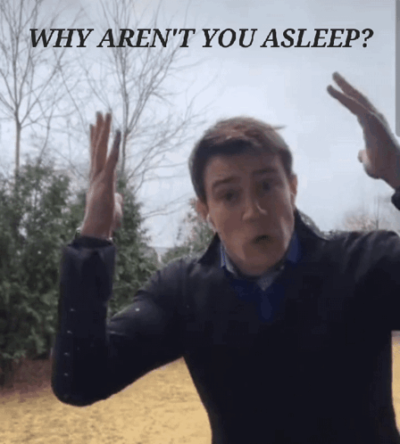 Man Making Funny Face Saying Why Aren't You Asleep