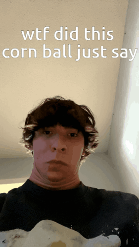 Man Making Funny Face Saying WTF Did This Corn Ball Just Say