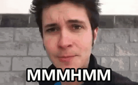 Man Making Funny Face Says Mmmmhmm