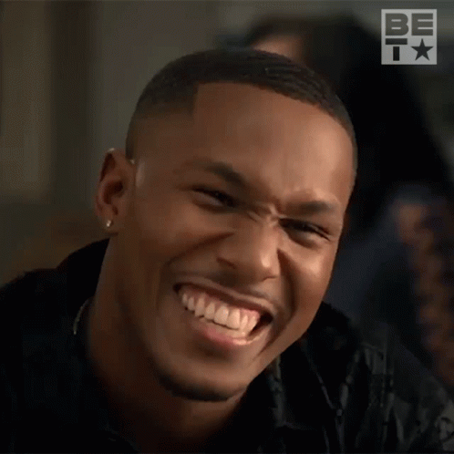 Man Making Funny Face With Bet Logo