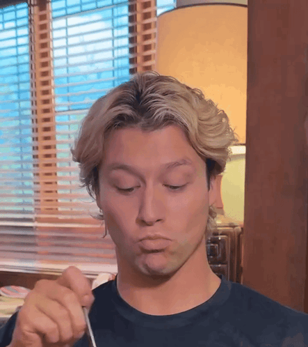 Man Making Funny Face With Fork