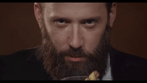 Man Making Glass Float With Pendulum GIF