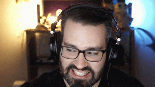 Man Making Grimace Face Rolling Eyes GIF