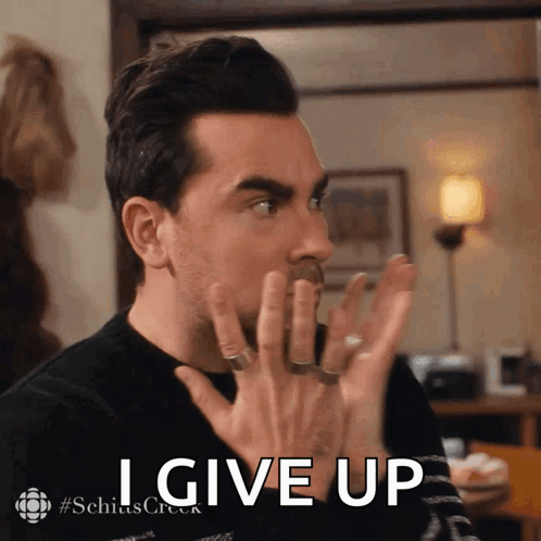 Man Making I Give Up Gesture
