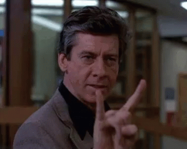 Man Making Peace Sign