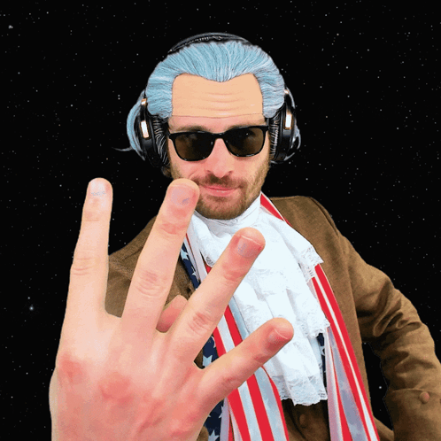 Man Making Peace Sign in Headphones and Sunglasses