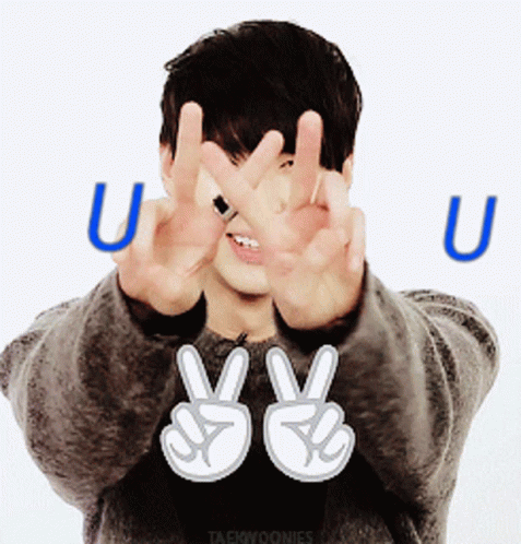 Man Making Peace Sign with Letter U Behind