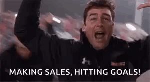 Man Making Sales Hitting Goals Hands in Air