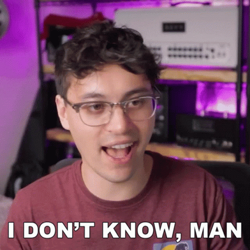 Man Maroon Shirt Glasses Saying I Don't Know