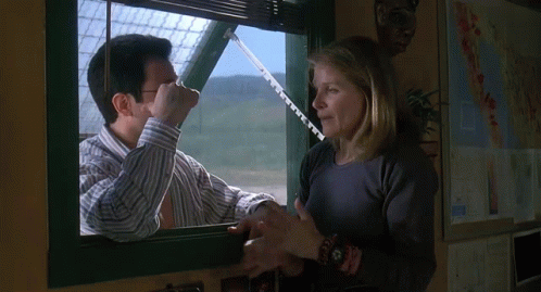 Man Measuring Woman Arm Out Window GIF
