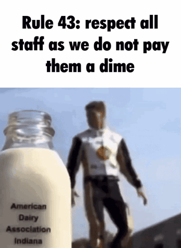 Man Next to Bottle of Milk Saying American Dairy Association Indiana