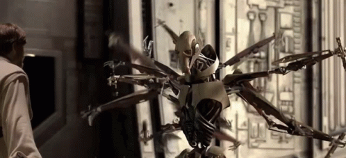 Man Next To Multi-Armed Robot GIF