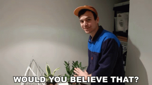 Man Next to Potted Plant Saying Would You Believe That