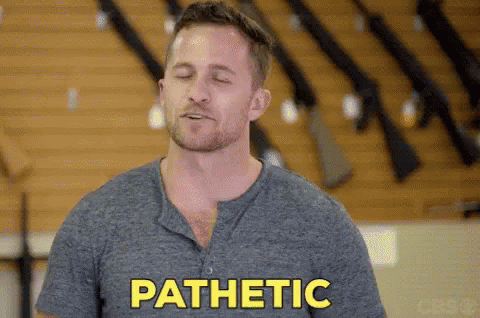 Man Nodding Saying Pathetic And Smile GIF