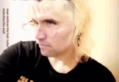 Man Notices His Hair Color Matched His Wall