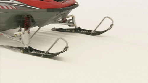 Man On A Snowmobile Saluting GIF