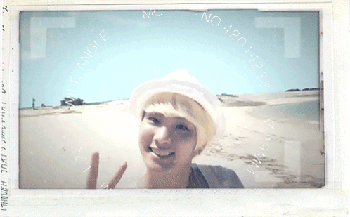 Man On Beach With Number 420 GIF