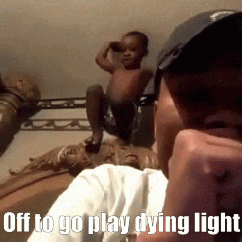 Man on Cell Phone With Baby Saying Off to Go Play Dying Light