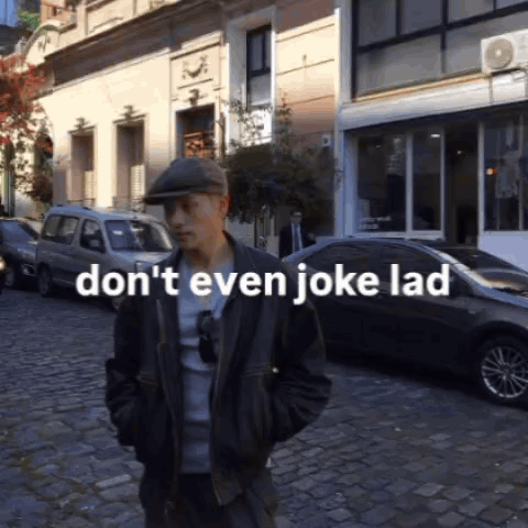 Man on Cobblestone Street Saying Don't Even Joke Lad