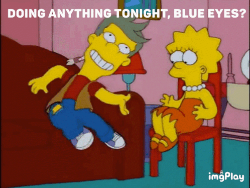Man on Couch and Woman in Chair Doing Anything