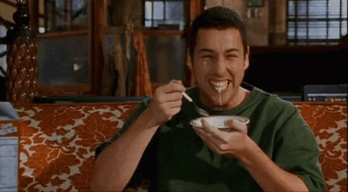 Man on Couch Eating Soup