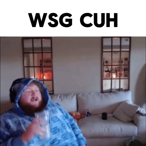 Man on Couch Holding Glass Saying WSG CUH