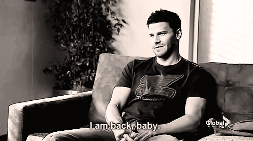 Man on Couch I Am Back Baby