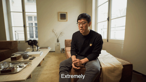 Man On Couch In Living Room Saying Extremely GIF