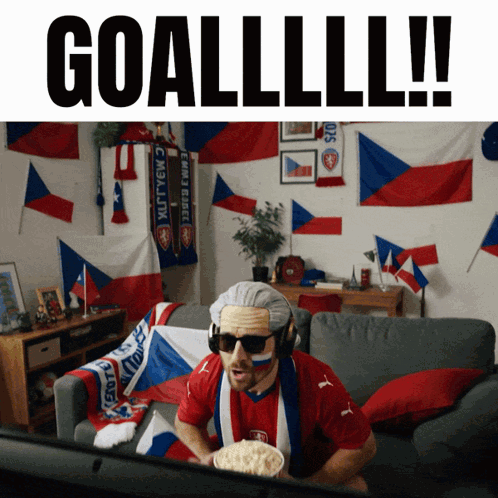 Man On Couch Watching Game Saying Goallll GIF