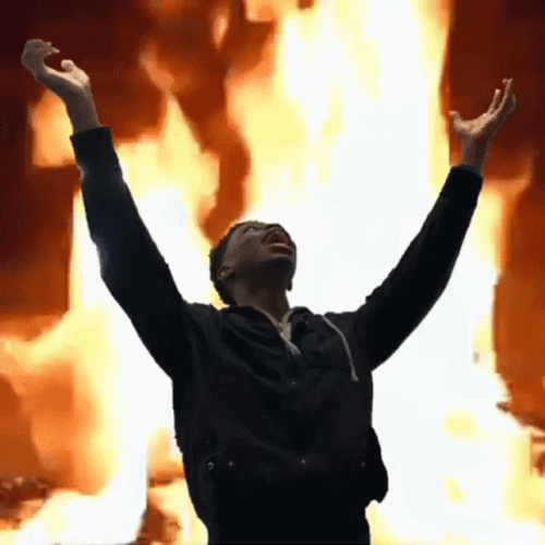 Man On Fire Arms Up Fiery Background GIF