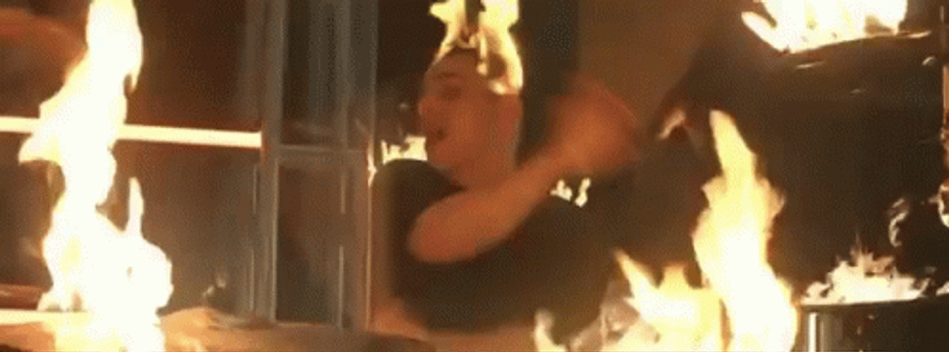 Man On Fire Playing Drums GIF