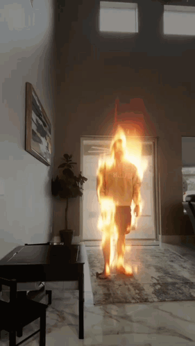 Man on Fire Wearing Hulk Shirt