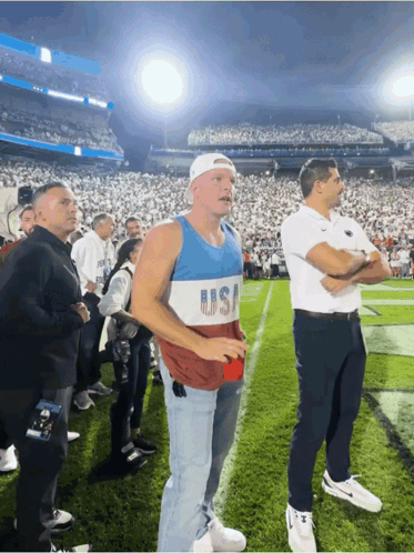 Man on Football Field in USA Tank Top