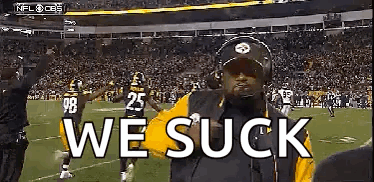 Man On Football Field Saying We Suck GIF