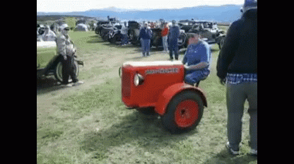 Man on Red Massey Ferguson Tractor