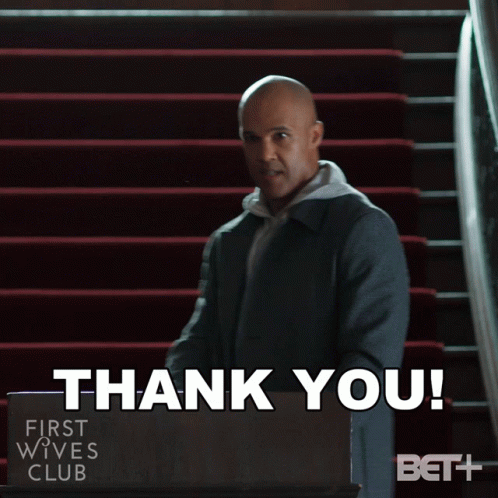 Man on Red Stairs Saying Thank You