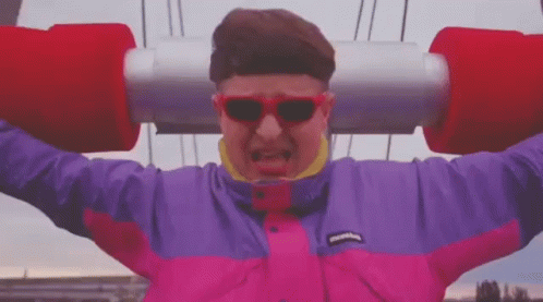 Man On Roller Coaster In Pink Purple Jacket Sunglasses GIF