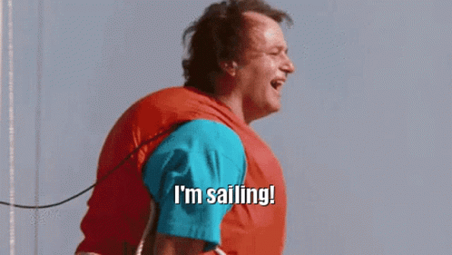 Man On Sailboat Saying I'm Sailing GIF