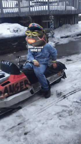 Man On Snowmobile With Larry GIF