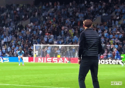 Man On Soccer Field With Nissan Banner GIF