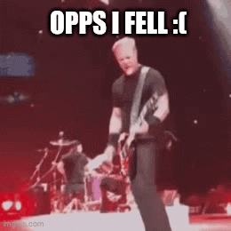 Man On Stage Playing Guitar Saying Opps I Fell GIF