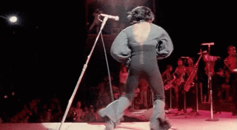 Man on Stage Saying I Feel Good