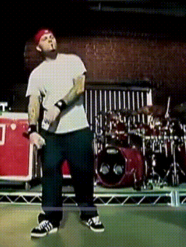 Man On Stage With Drum Set GIF