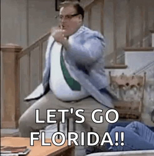 Man on Stool in Living Room Let's Go Florida