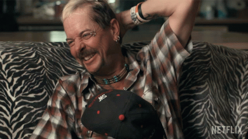 Man on Zebra Print Couch with Netflix