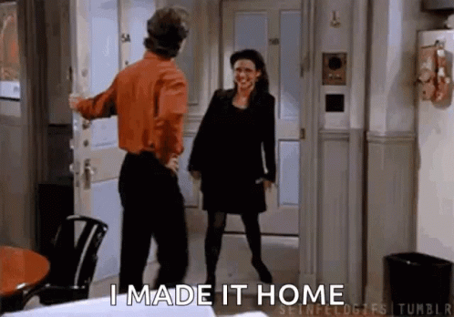 Man Opening Door for Woman in Hallway