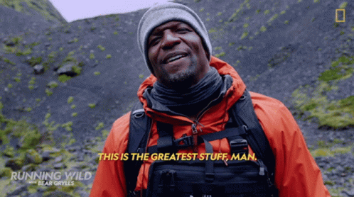 Man Orange Jacket Gray Beanie Says Greatest Stuff